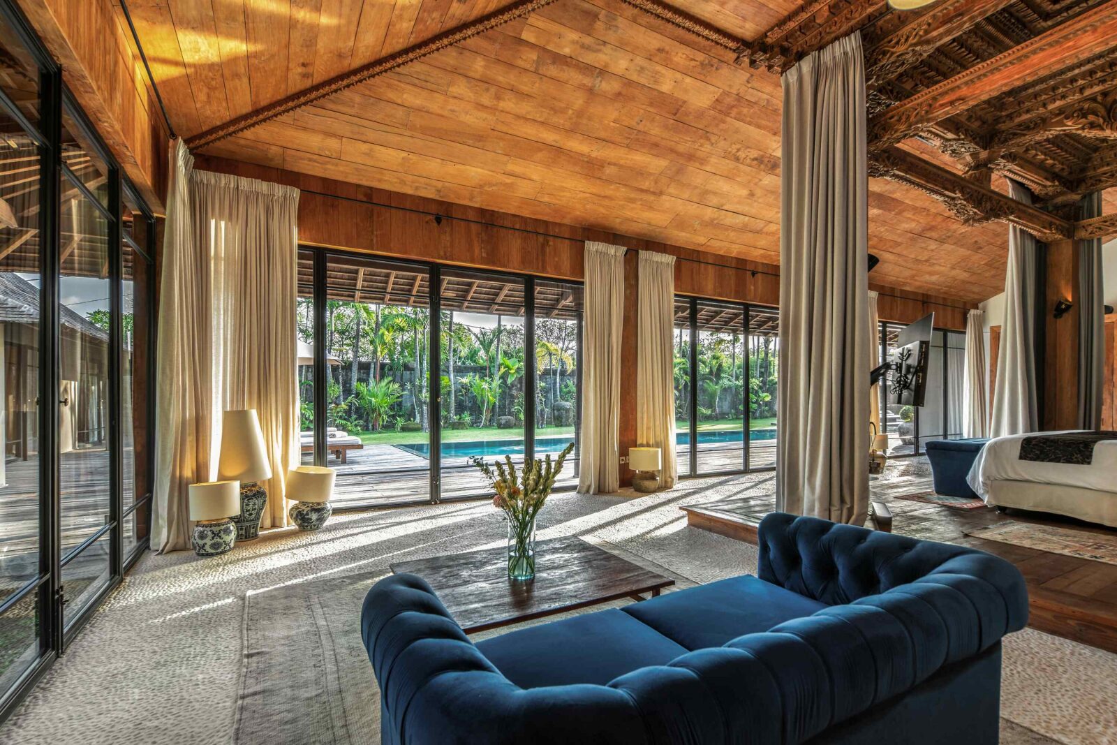 The master suite lounge behind its full-height glass wall