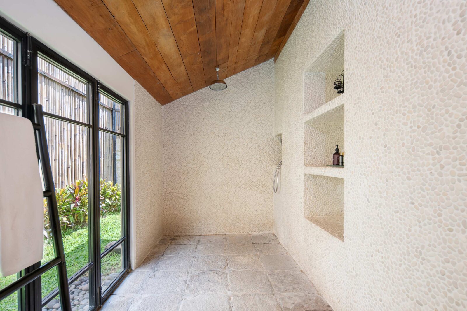 The rain shower room in the master bathroom