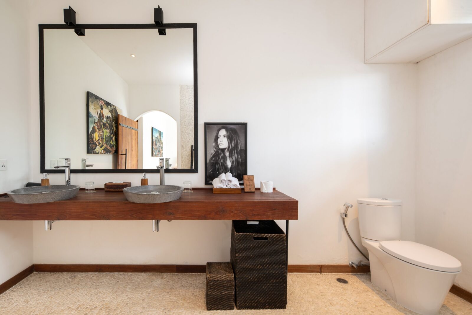 The double vanity in the pool-view bedroom's bathroom