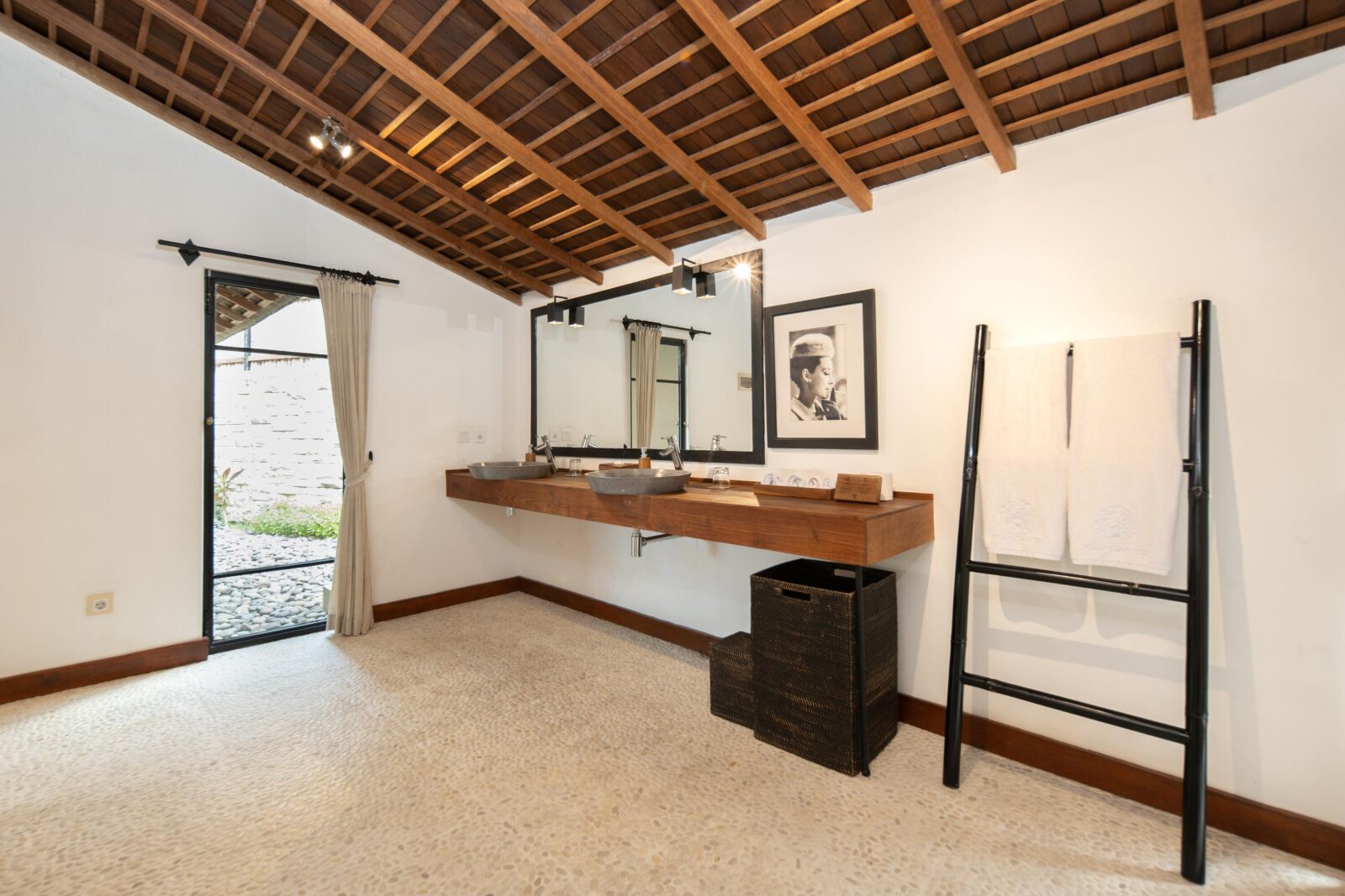 The bathroom shared by the two pool house bedrooms, with its garden door